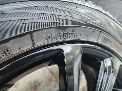 A set of 4 wheels on rims, size 205/55R16 94H Excellent condition! Used for only one winter season,...