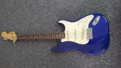 Brand and Model: Squier by Fender Stratocaster part of the Affinity series Finish: Gloss blue body w...
