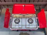 20,000 BTU camping stove in new condition.