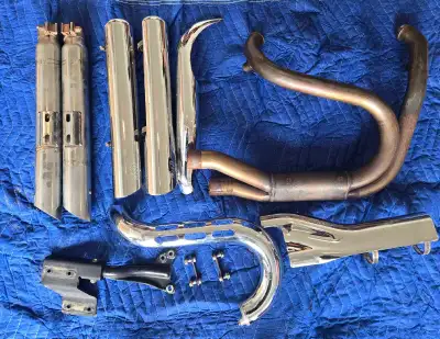 Vance and Hines 3" slash cut slip on. With exhaust system for a dyna.