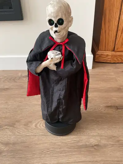 This animated skeleton Halloween prop is ready to add a spooky touch to your seasonal decorations. I...