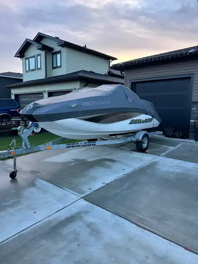 Seadoo Challenger. 215 horse power. Low hours of 100 give or take. Very clean boat