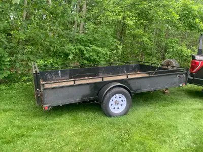 Action trailer, Kargo Max model. 12x7 foot utility trailer Bi fold ramp New wheels and rims in 2024...