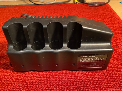 Black and Decker 4 battery compartment charger for Versapak 3.6V batteries. Batteries are not includ...