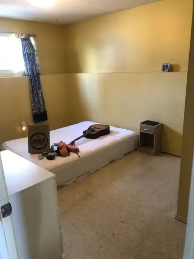 Includes utilities Has bed etc NOT guitar Shared kitchen and common space Driveway