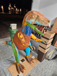 Giant metal dinosaur.  Needs a fresh coat of paint.