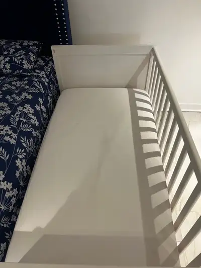 Hello, I’m selling a white wooden convertible baby bedside crib/co-sleeper. It can be used beside an...