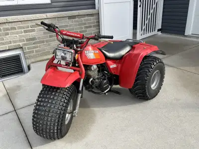 1985 Honda ATC 200M in beautiful condition. Electric start and pull start back up. Everything works....