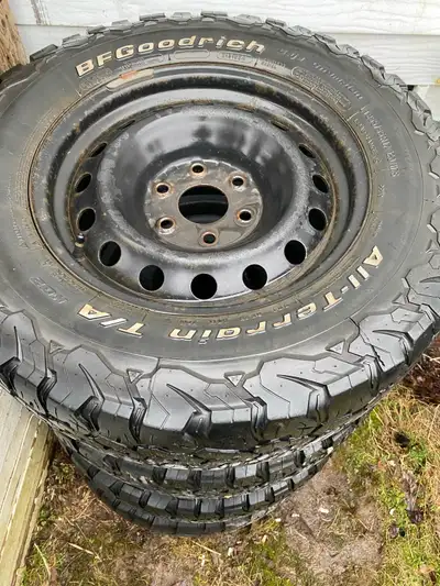 (4) BF Goodrich all terrain tires 265/65/17 on 6 bolt steel rims 6 x 139.7