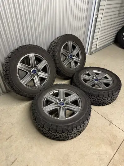 20” F150 Lariat 6x135 bolt pattern rims with OEM Ford TPMS + LT275/60R20 General Grabber A/Tx (Load...