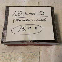 CD: Caisse de 100 boitiers de cd minces transparents.