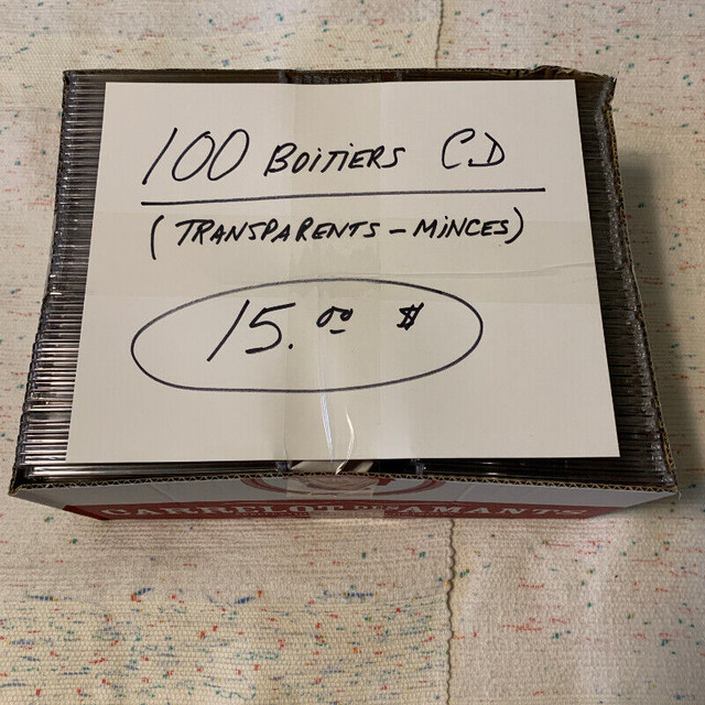 CD: Caisse de 100 boitiers de cd minces transparents. dans CD, DVD et Blu-ray  à Ville de Québec