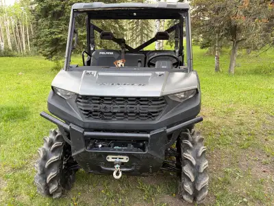 2020 Polaris Ranger 1000 UTV. Gray color with aggressive mud tires. Has a front-mounted winch and a...