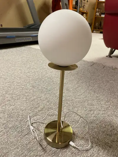 Illuminate your space with this brand new Dwell Studio rechargeable table lamp, featuring a sleek go...