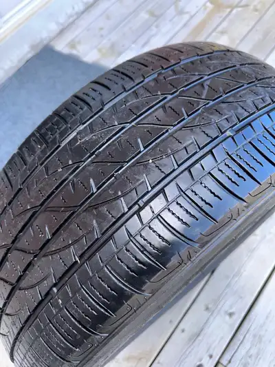 Get ready to roll with this Firestone Destination LE2 tire, size 235/50R18, perfect for your next ad...