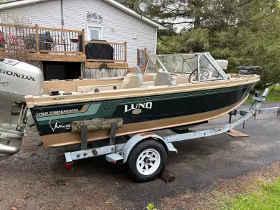 2000 Lund 1750 with 90 Honda outboard Does have top 2 power down riggers with rods plus a few other...
