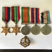 WW2 Australian War Medal Group and Badge $300