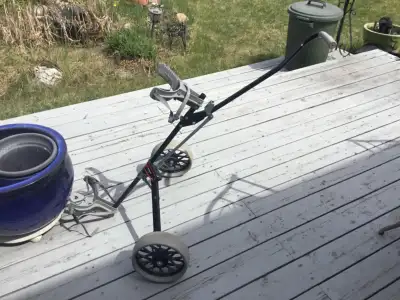 I have a golf cart lightly used, has perpendicular handle so you can pull or push. Folds down for ea...
