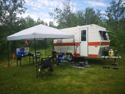 Vintage 1980 Okanagan Scamper travel trailer Comes with: - Gazebo with mesh screen/curtain (10 ft by...