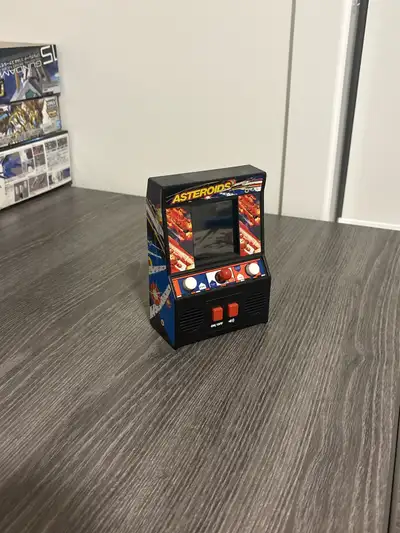 Relive the 80's with this used, but good condition, basic version of the classic Asteroids arcade ga...