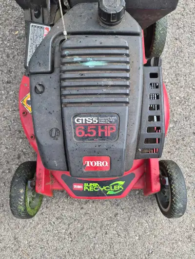 Top of line Toro self propelled Commercial Mower ,gently used on small city lot ,,Bag is excellent n...