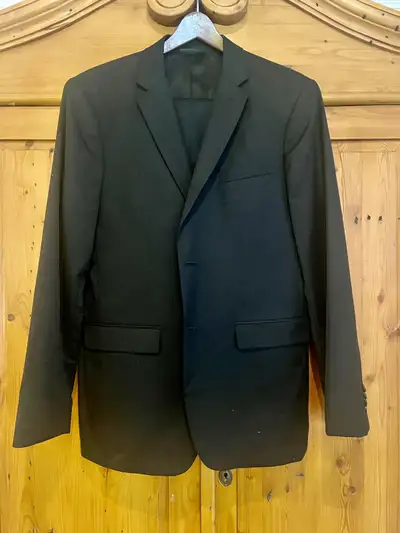 I have this suit that I bought, only to realize that I never wear it…. Classic athletic fit. So… It’...