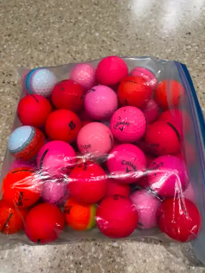 Assorted Red and Pink Golf Balls, View more