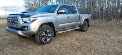 The 2016 Toyota Tacoma TRD Sport 278-hp 3.5L V6 engine, sport-tuned suspension, and 17-inch alloy wh...