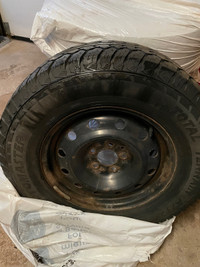 Four Winter tires on rims 235/70/16