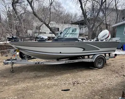 2014 Alumacraft Competitor 175 LC with 115 hp Evinrude ETEC motor on a single axle eagle trailer. Bo...