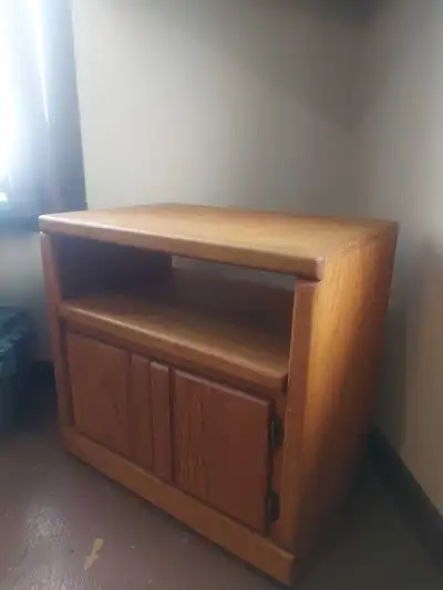 Small TV Stand or Microwave Stand (or whatever use you have for it!). 26"x16". Solid wood. With encl...