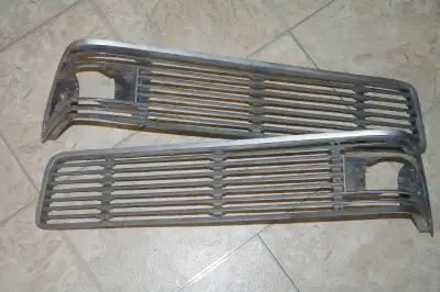 Left and right grille sections, Fits all models. In good condition, no breaks. Some pitting but will...