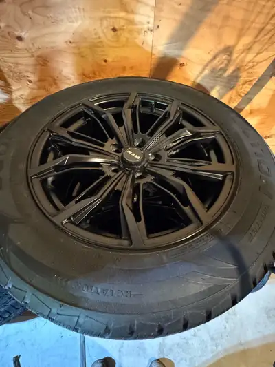 2024 VW Tiguan 17” RTX alloy wheels with Cooper Evolution winter studded tires 215/65/17, some studs...