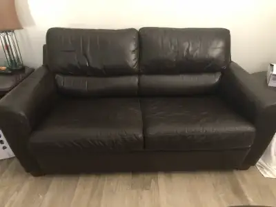 Decent shape. I need a larger couch. Small tear on right arm. Small leather patch covers it.