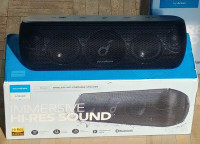 Soundcore Motion Plus Portable Bluetooth Speaker with its box