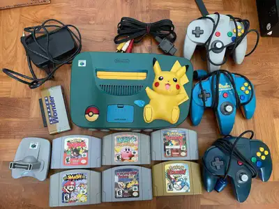 nintendo 64 pikachu console with games, View more