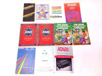 Collection of Vintage Atari Console and Game Catalogs