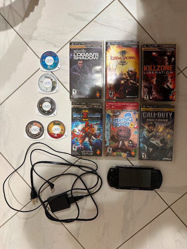 PSP 2001 with 4GB Memory, Charger, Games but no Battery Lot $200 in Sony PSP & Vita in City of Toronto