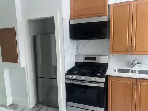 this newly self-contained rental unit on second floor, with all new appliances, unit has its own ent...