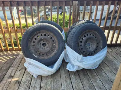Set of snow Tires on rims Used last year...did not use this past winter. I paid $100 for the rims......