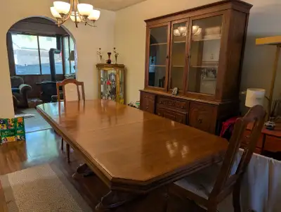 This is a vintage solid Oak Dining room table, buffet and hutch. This set has a beautiful, classic d...