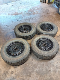 235/70r16 Cooper winter tires studded with rims 