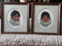 Four vintage cross stitch needle point in wood frame.