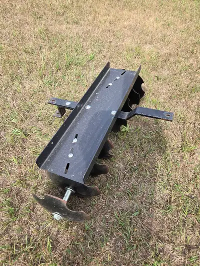 Agri Fab discer, made to pull behind a garden tractor or quad. Strap weights to the top to dig down...