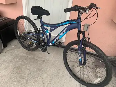 Hyper Bicycle 26" Swift Ladies' Dual Suspension Mountain Bike. It features a strong steel frame, fro...