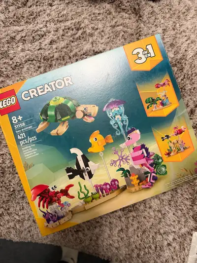 This brand new Lego Creator Sea Animals 3-in-1 set, number 31158, contains 421 pieces for building a...