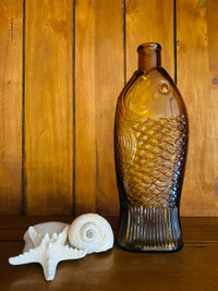 Vintage brown fish shaped Lilly cod liver glass bottle 