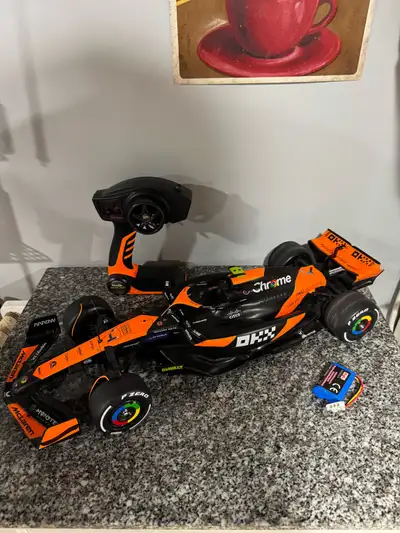 McLaren F1 R/C Car. Comes with battery and remote but missing the charger and the battery is dead. I...