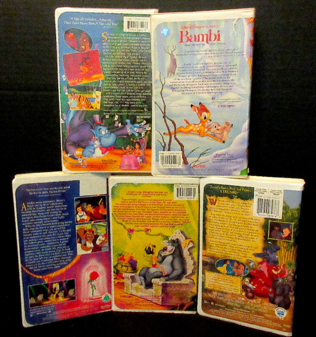 Disney Clamshell Movies VHS x 5 "Bambi, Aladdin, Tarzan, etc" VG in CDs, DVDs & Blu-ray in Stratford - Image 2