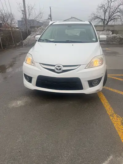 Je vends mon Mazda 5 Toit ouvrant Vitres électriques 277 300 kilomètres